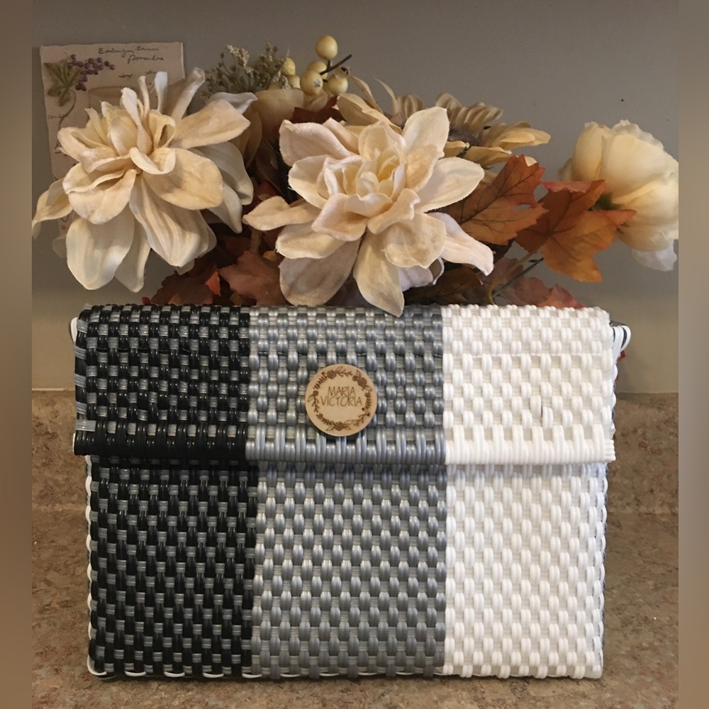 MARIA VICTORIA black, white, and grey plastic woven clutch
